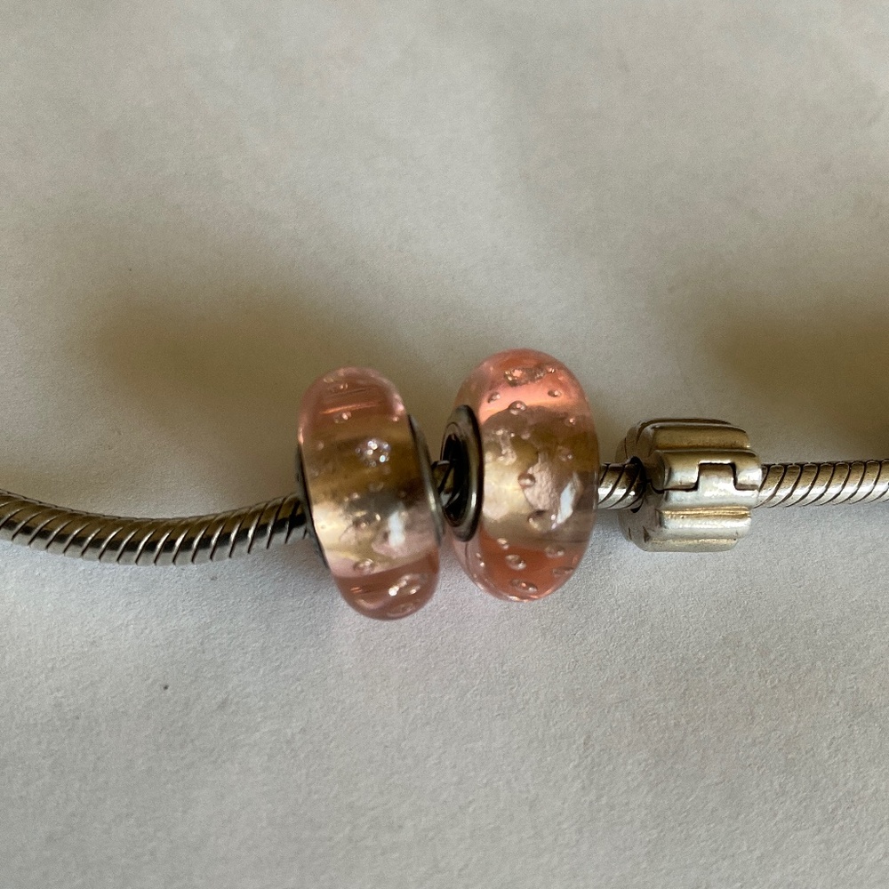 Two Pandora charms